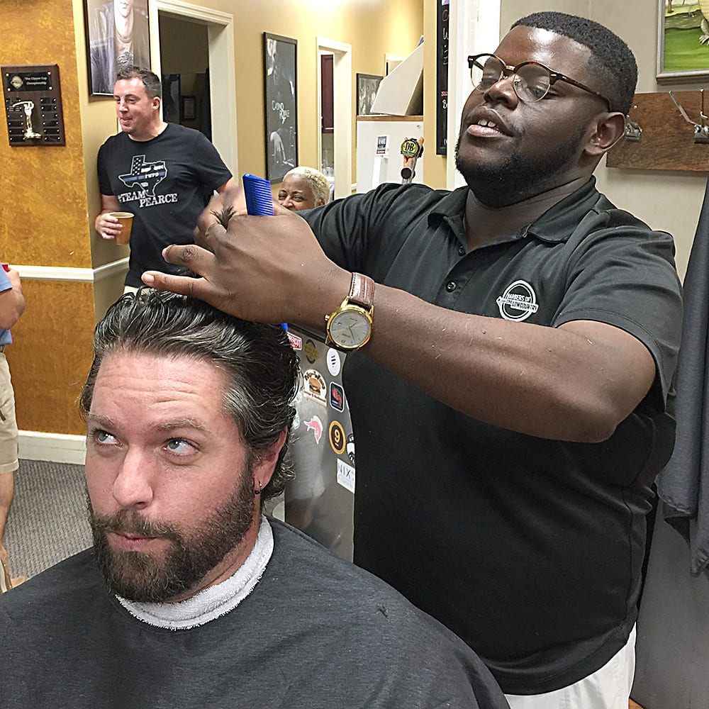 Paddy and Derris are well known barbers at Barbers of the Lowcountry