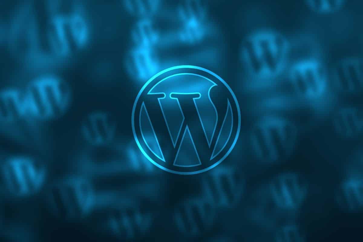 Wordpress logo over a ghosted background